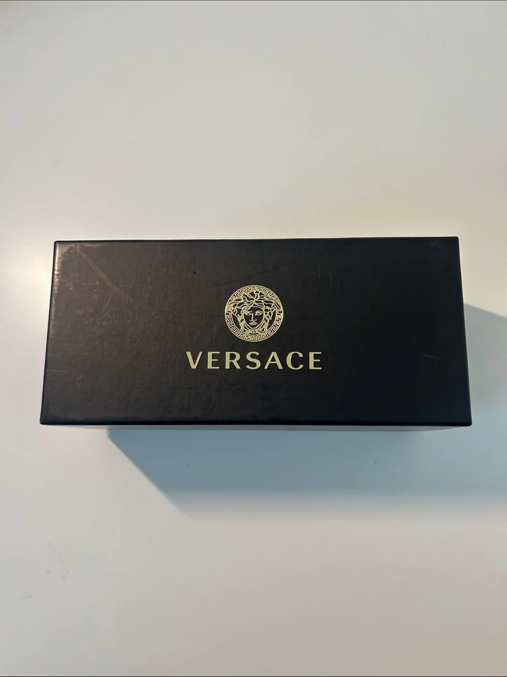 Versace selling pair